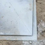 Concrete pad for construction site preparation