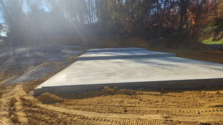 Concrete slab foundation installed for metal building