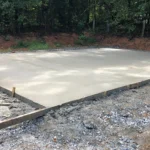 Smooth concrete slab curing after being poured